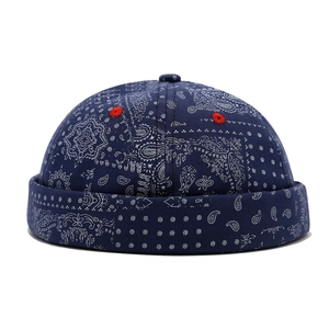 Navy blue paisley miki hat with adjustable cotton brimless design and red ventilation holes