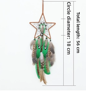 Detail of star-shaped dreamcatcher with green feathers, 18cm ring and 56cm total length