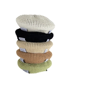 Hollow straw knit beret hats for women in five colors showing breathable texture