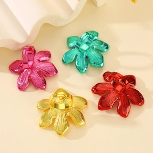 Detailed macro view of vibrant flower rings featuring textured metal petals in 4 colors