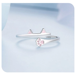Close-up of S925 silver cat ring with pink paw print and adjustable open band design