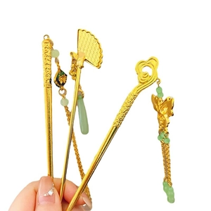 Traditional Chinese gold tassel hairpins set with green beads and jade pendants