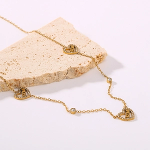 18K gold plated necklace with LOVE heart pendants and sparkling crystals on stone base