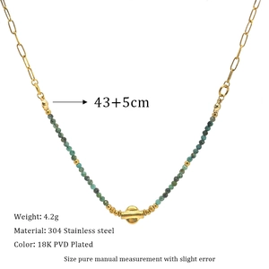 Detailed view of 18K gold plated stainless steel necklace with green stone beads