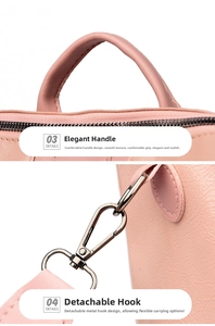 Detail of pink PU leather backpack showing round top handle and detachable metal hooks