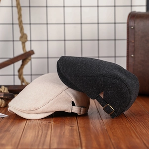 Classic newsboy flat caps in beige and dark grey wool for men and women with metal buckle