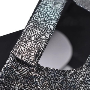 Close-up of the adjustable silver glitter strap on the back of the sequin baseball cap