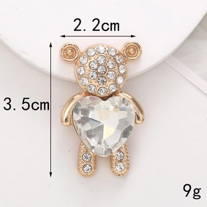 Ciondolo orsetto dorato con cristallo a cuore trasparente e strass bianchi, h 3,5cm