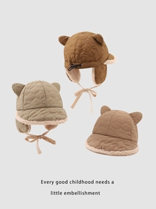 Detail of children winter hats with heart quilting, plush lining and cute bear ears