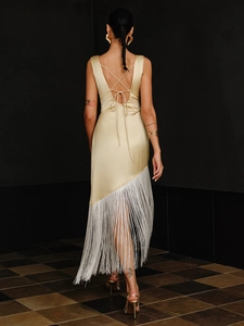 Elegant champagne satin dress with white tassels and backless crisscross strap design