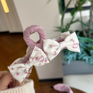 Pink floral fabric hair claw clip with pleated bows and sweet vintage countryside design