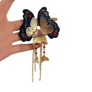 Elegant butterfly open ring with blue embroidery details and delicate gold metal fringe