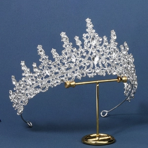 Luxurious silver bridal crown with purple crystals and sparkling rhinestones for parties