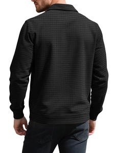 Close-up of black waffle texture fabric and collar detail on men's casual cardigan