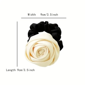 French style black satin scrunchie featuring a large cream rose ornament, 9cm diameter