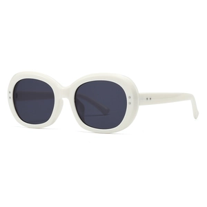 Modern retro oval white sunglasses with dark lenses and silver rivet decorations