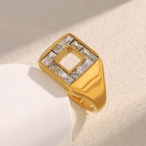 Macro shot of 18K gold plated square geometric ring with channel-set baguette zircons