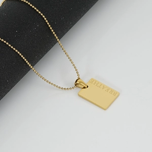 Minimalist gold stainless steel square pendant necklace with Breathe engraving