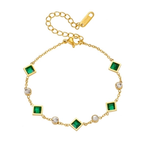 Detail of gold-plated stainless steel chain with green emerald and clear round crystals