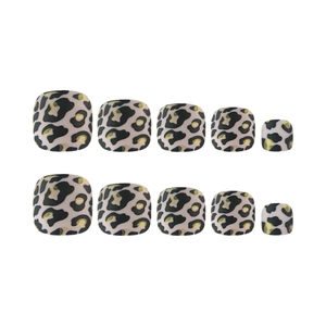 Classic leopard print press on toenails with gold glitter spots on white background