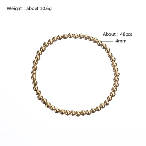 Detail view of 4mm gold beaded elastic bracelet with weight and piece count specifications