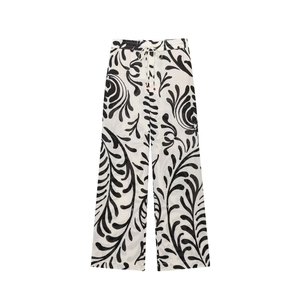 Women's black and white leaf print wide leg trousers with elastic drawstring waist