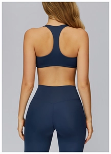 Rear view of navy blue racerback yoga bra and high waist leggings fitness set