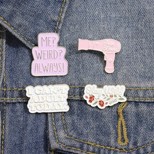 Cartoon enamel pin set with creative letter slogans on classic blue denim jacket fabric