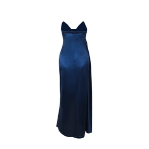 Detailed view of dark blue satin evening dress featuring a slim fit and thigh-high slit