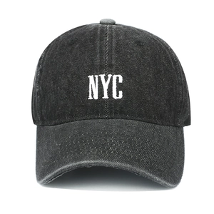 Vintage washed denim baseball cap with white NYC embroidery and classic curved brim