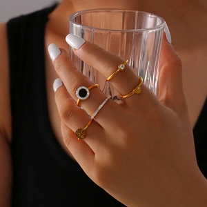 Set of 5 18K gold plated stackable rings with Tree of Life, heart, and crystal accents