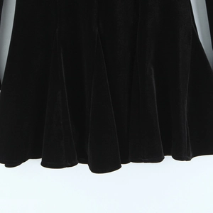 Slim fit black velvet A-line dress with elegant draped texture and glossy finish