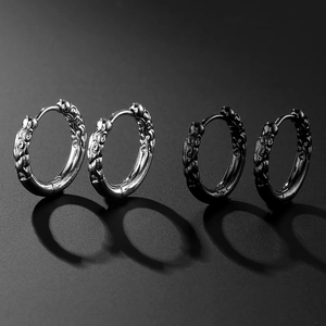 Unisex titanium steel hoop earrings with embossed pattern in silver and black colors