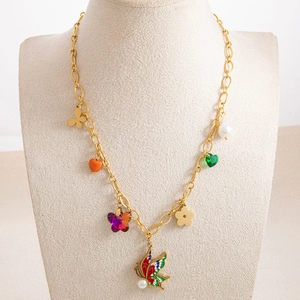Rainbow charm necklace with colorful enamel butterflies and pearls on a gold chain