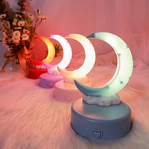 DIY crescent moon and cloud night lights in four colors on round bases with heart buttons