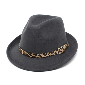 Detailed macro view of dark grey wool fedora hat featuring leopard print belt and gold buckle