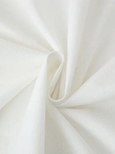 Vue macro de la texture du tissu en coton et lin blanc avec des plis naturels doux