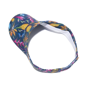 Detailed top view of a colorful floral print visor sun hat with white lining