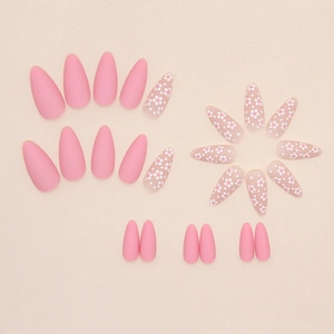 Matte pink almond press-on nails set with white daisy floral design on nude background