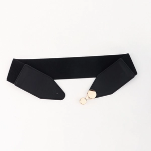 Detailed close-up of a black elastic waist belt with gold round buckle and leather texture