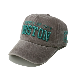 Close-up of Boston embroidery on vintage washed cotton baseball cap with retro details