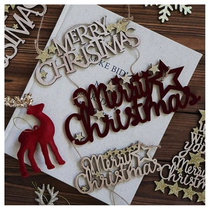 Festive Christmas decor with Merry Christmas wooden sign and red flocked deer figurines