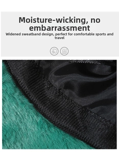 Detail view of the green plush frog hat featuring a widened moisture-wicking sweatband inside