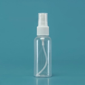 Macro shot of 10-100ml clear plastic PET spray bottle with white mist pump head