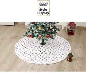 Detail of white plush Christmas tree skirt with colorful tree patterns on wooden floor
