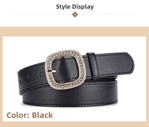 Close-up of black leather belt with square buckle featuring sparkling rhinestone inlay