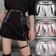 Detail view of multi-color PU leather punk harness belts in black, red and pink styles
