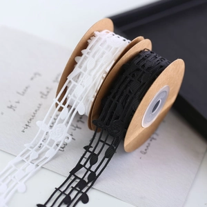 Elegant musical note lace ribbon in black and white for gift wrapping and DIY crafts