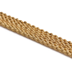 Close-up of golden twisted rope chain with intricate woven texture on white background