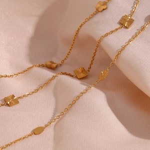 18K gold plated stainless steel layered bracelet with geometric floral charm pendants